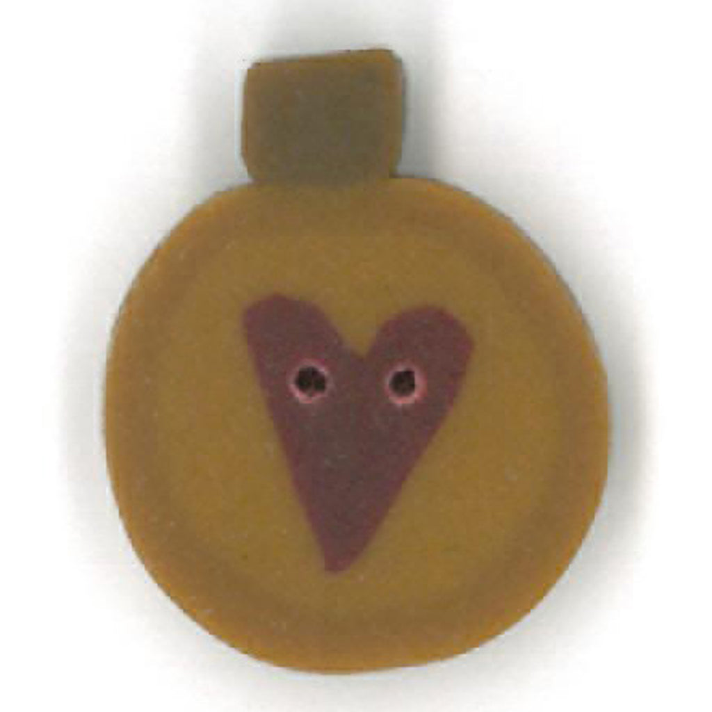 primitive gold ornament (heart)